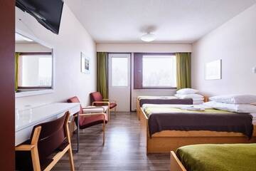 Фото номера Небольшой трехместный номер Отель Hotelli Pielinen г. Вуонислахти 7